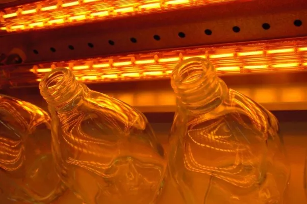 Infrared heating for glass finishing
